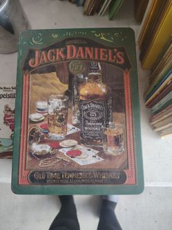 Vintage jack Daniels tin with bottle and cuos