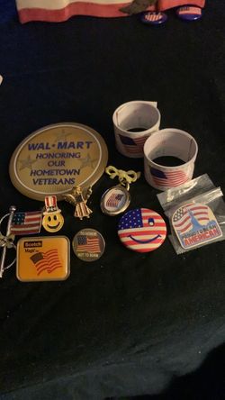 Assortment of Patriotic pins & items.