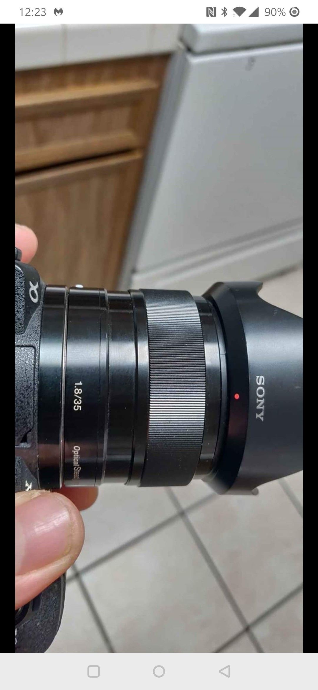 Sony a5100 with Sony 1.8/35 oss lens red description in pics