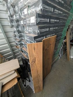 STAINMASTER Beckett Ridge Chestnut Waterproof Laminate Flooring New