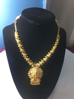 Gold plated necklace with earring. Color guaranty,Rubi stone work.