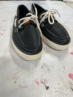 Nautica Galley men's boat shoes, featuring a navy blue exterior and a size 7.5 US