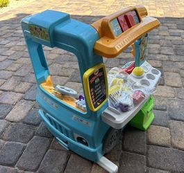 This is a Fisher-Price Laugh & Learn Servin' Up Fun Food Truck 