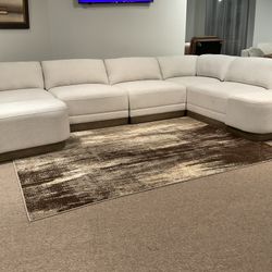 New beige stationary sectional with 2 storage ottomans