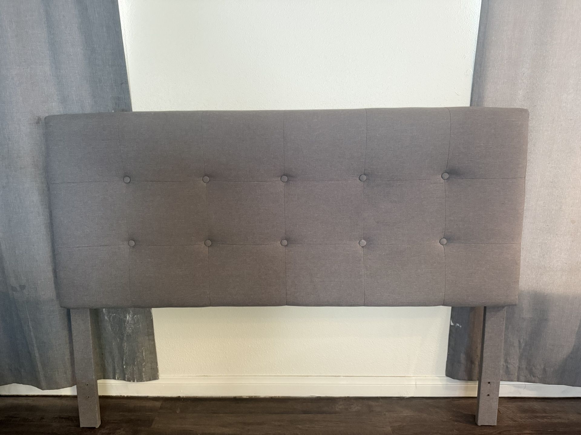 Gray Fabric Queen headboard 63”x46”x4”. Located in Huntington Beach.