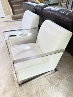 Two White single armchairs