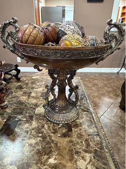 Antique pedestal bowl with vintage orbs