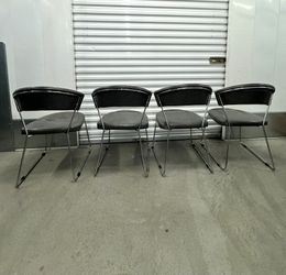 4 Gray Upholstered Dining Chairs with Chrome-Tone Bases