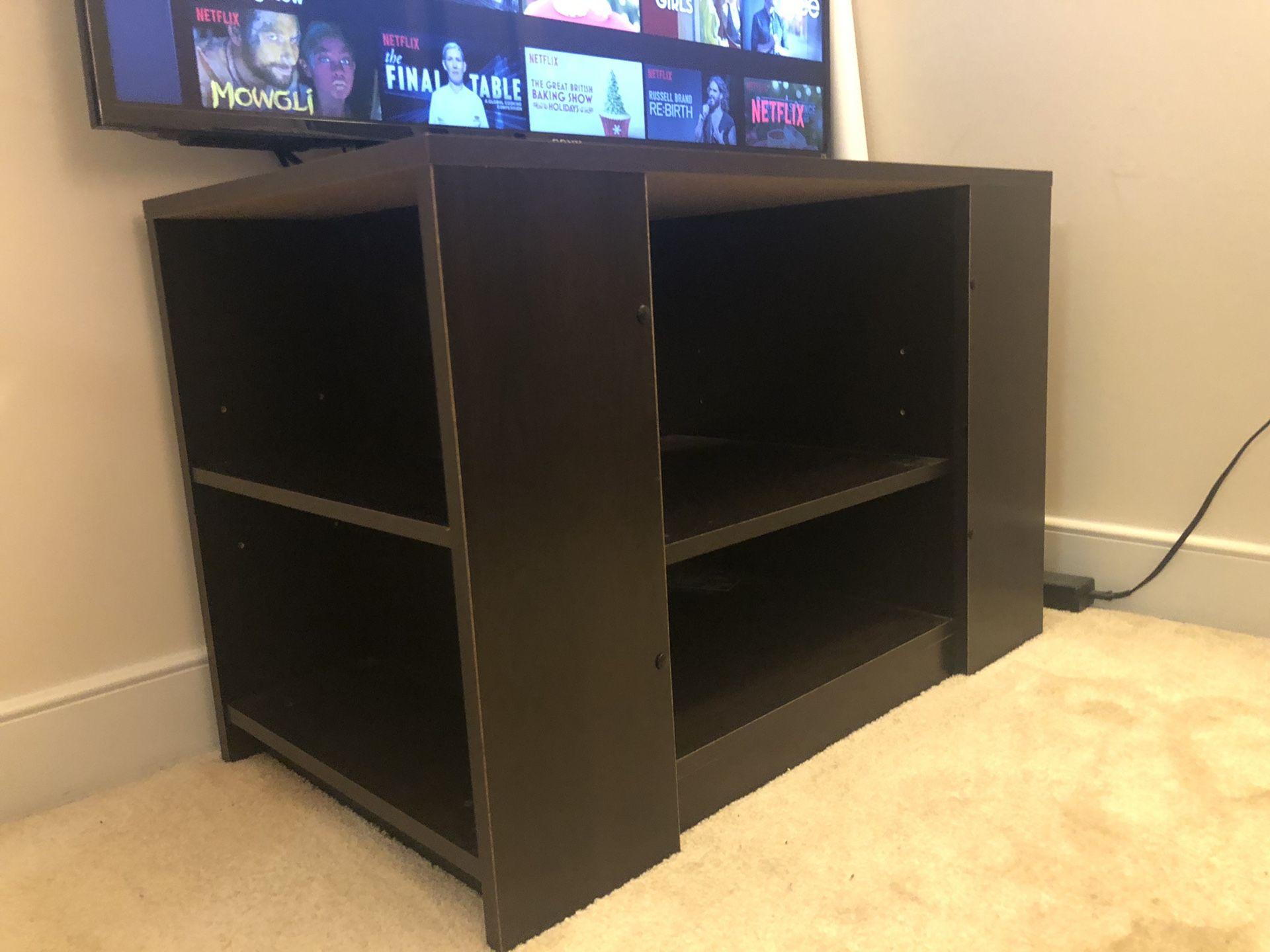 Brown TV stand and shelf