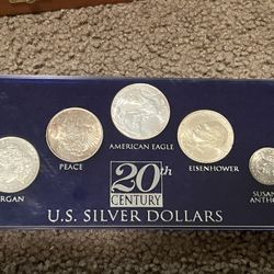 20th Century U.S. Silver Dollars 1921 S Morgan, 1922 Peace, 1999 Silver Eagle, 1973 S Silver Ike, And 1979 Susan 