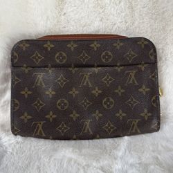 Louis Vuitton Orsay Monogram Clutch Bag