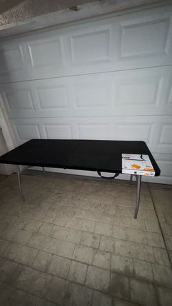 HDX 6 ft. Black Resin Top Indoor/Outdoor Rectangular Folding Utility Table, Seats 6