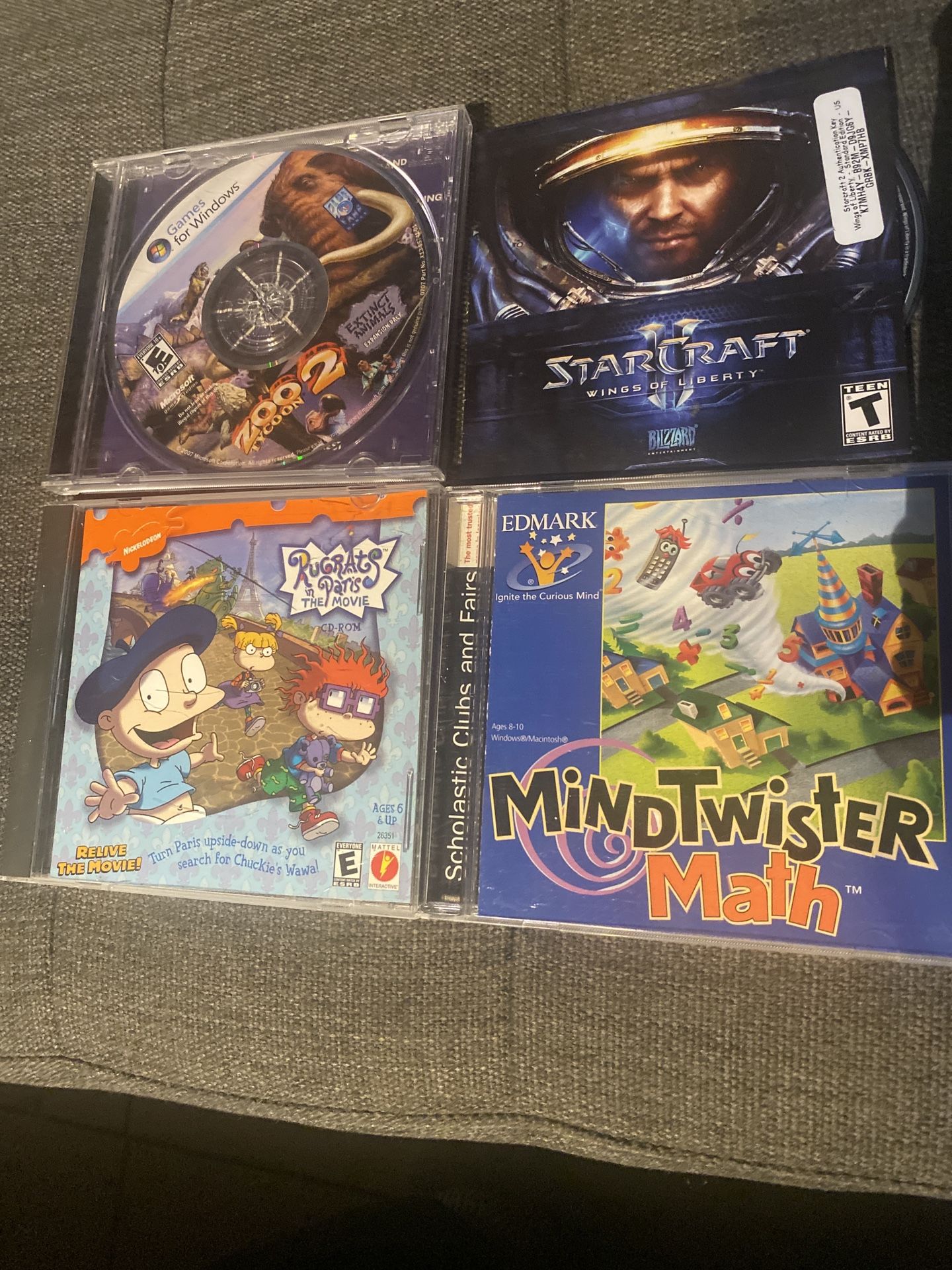 PC Game Bundle - Zoo Tycoon 2, StarCraft II, Rugrats, MindTwister Math