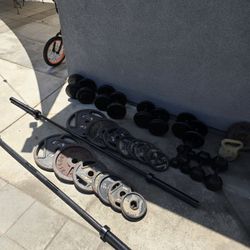 OLYMPIC WEIGHTS WITH BARS AND DUMBBELLS 
