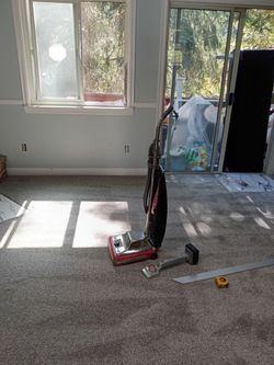 Installation of carpet.