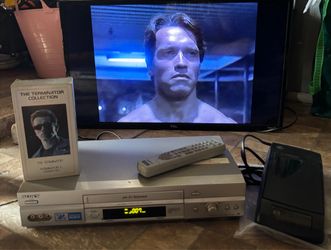 Sony vhs player with control and rewinder
