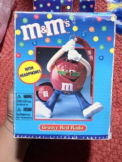 Vintage M&M's Groovy Red AM/FM Radio packaged with headphones, manufactured by Mars,