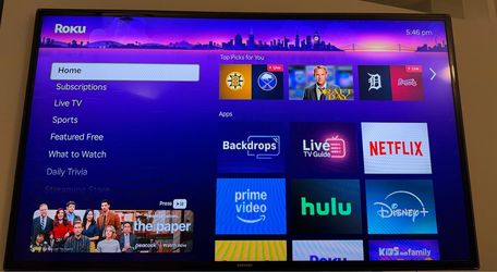 Samsung 50" 1080p Smart TV with Roku and built in TV Stand