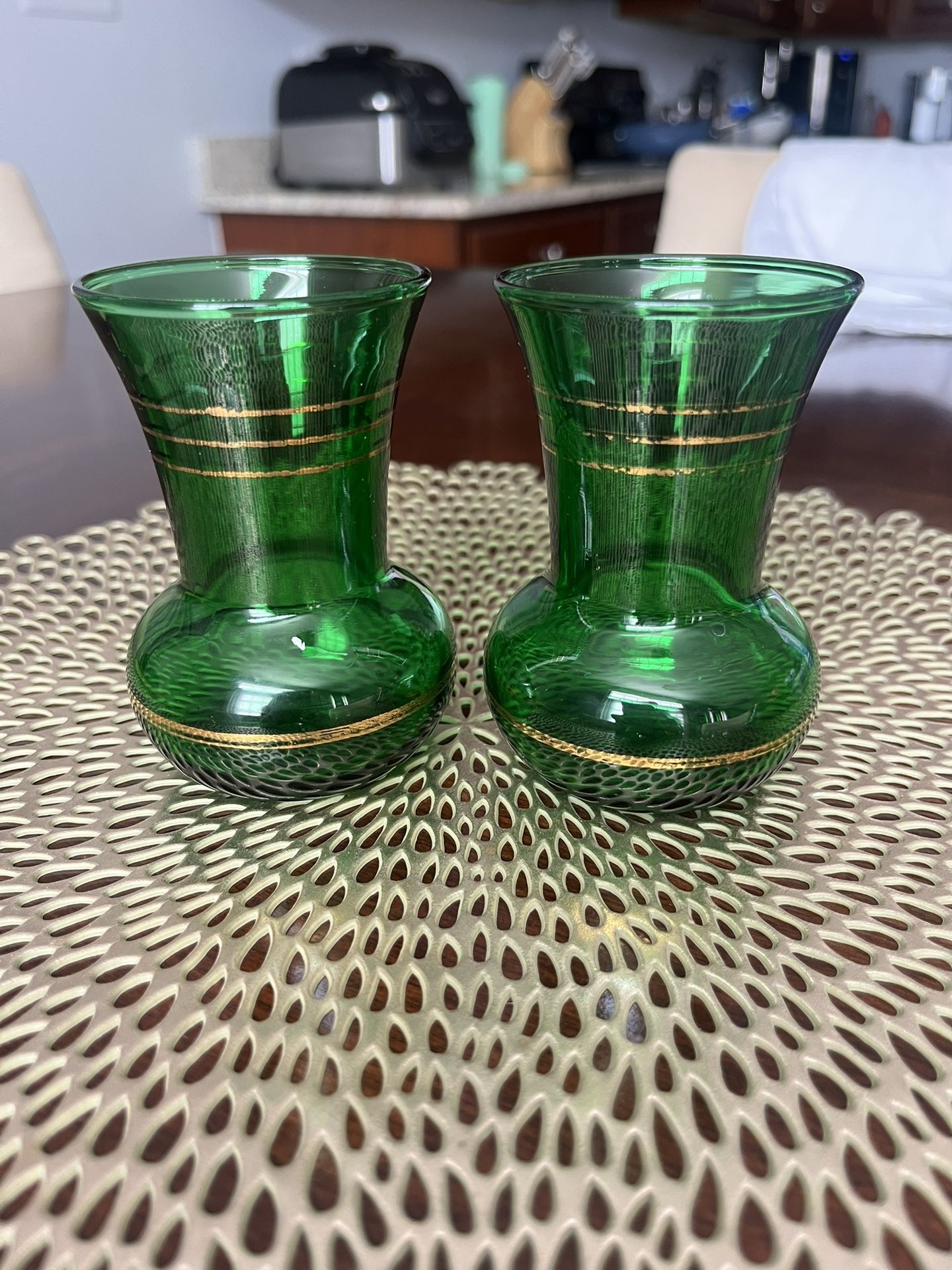Two vintage 1950s small flared emerald green vase with gold accents