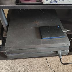 PS4 Pro, Controllers, 2TB Drive, Charging Station, And Cables