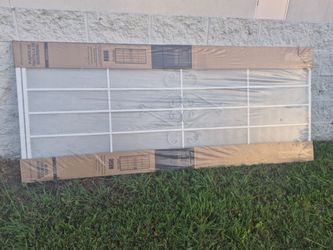 Brand new screen door for house. See pictures for details.