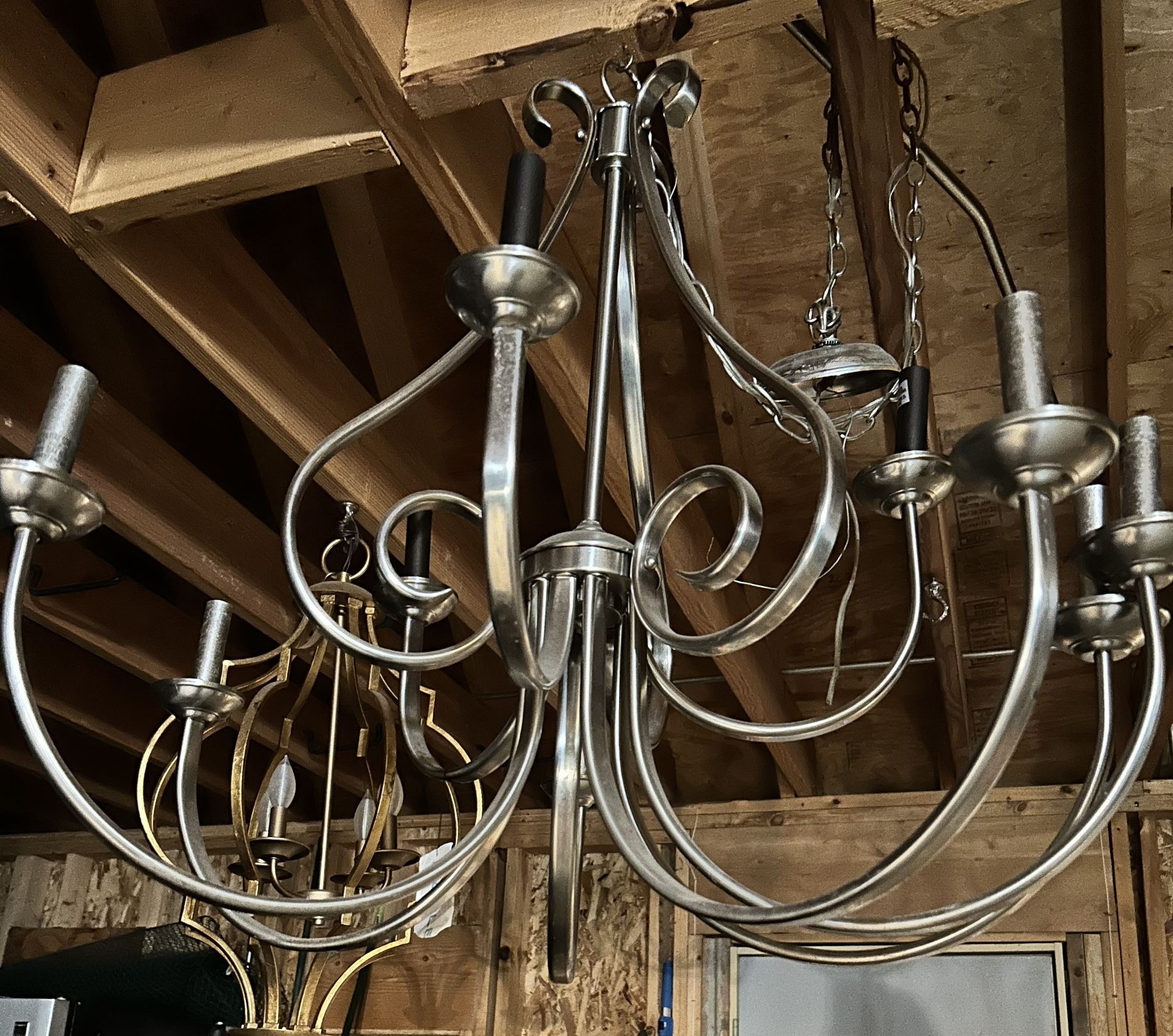 VERY LARGE CHANDELIER TO LIGHT UP ANY ROOM WHILE SERVING AS THE DESIGNER CENTERPIECE ALL GUESTS ARE AMAZED BY!