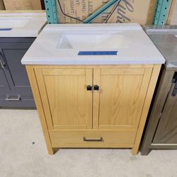Brand new 30”  Bathroom Vanity in natural wood finish and simple lines ,Soft close Two Doors and a Drawer with Black Handles and Top in white $399