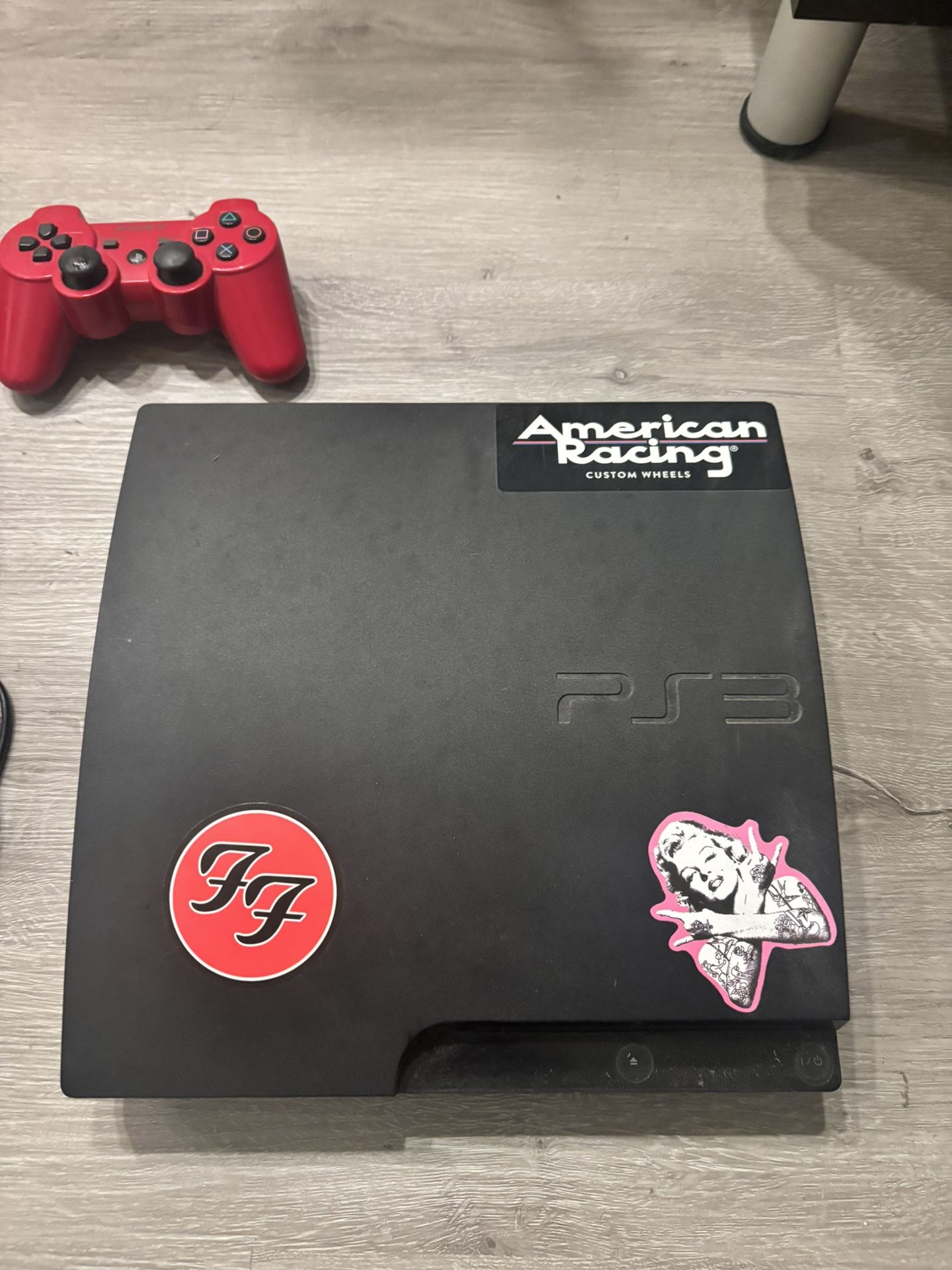 PLAYSTATION 3 w/ games and controller