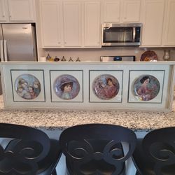 EDNA HIBEL 18K. GOLDS PLATES 