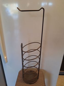 Toilet paper reserve and dispenser