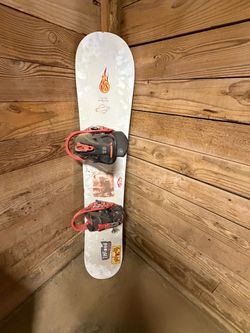 Burton 140 Snowboard with Red Bindings
