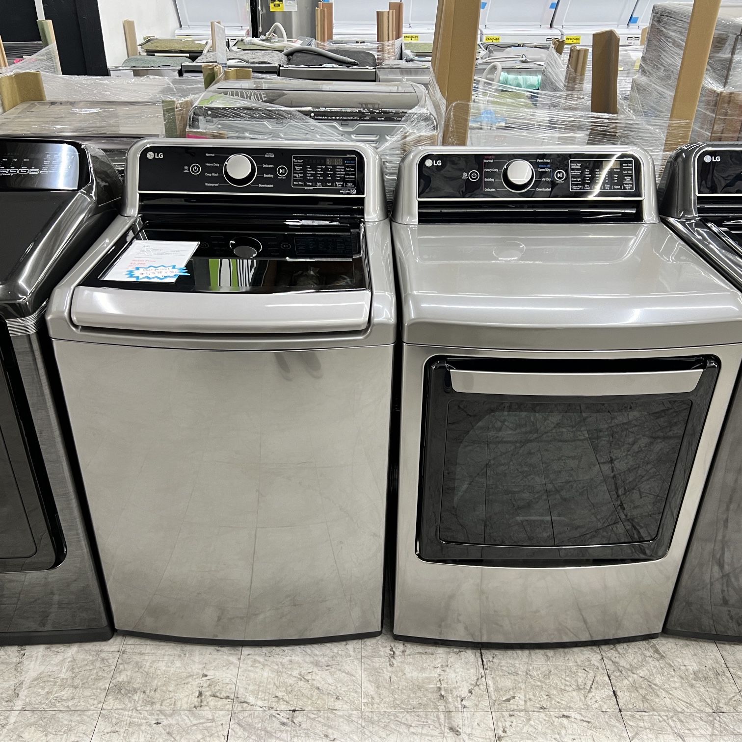 LG 5.5 cuft Top Load Mega Capacity washer and dryer in graphite steel 