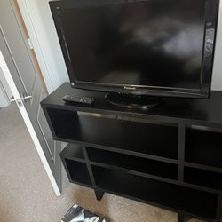 Panasonic TV w/ TV Stand and Fire stick 