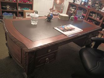 Executive desk, all nice wood carved 3.Shells behind it , they come in three different pieces and a nice chair