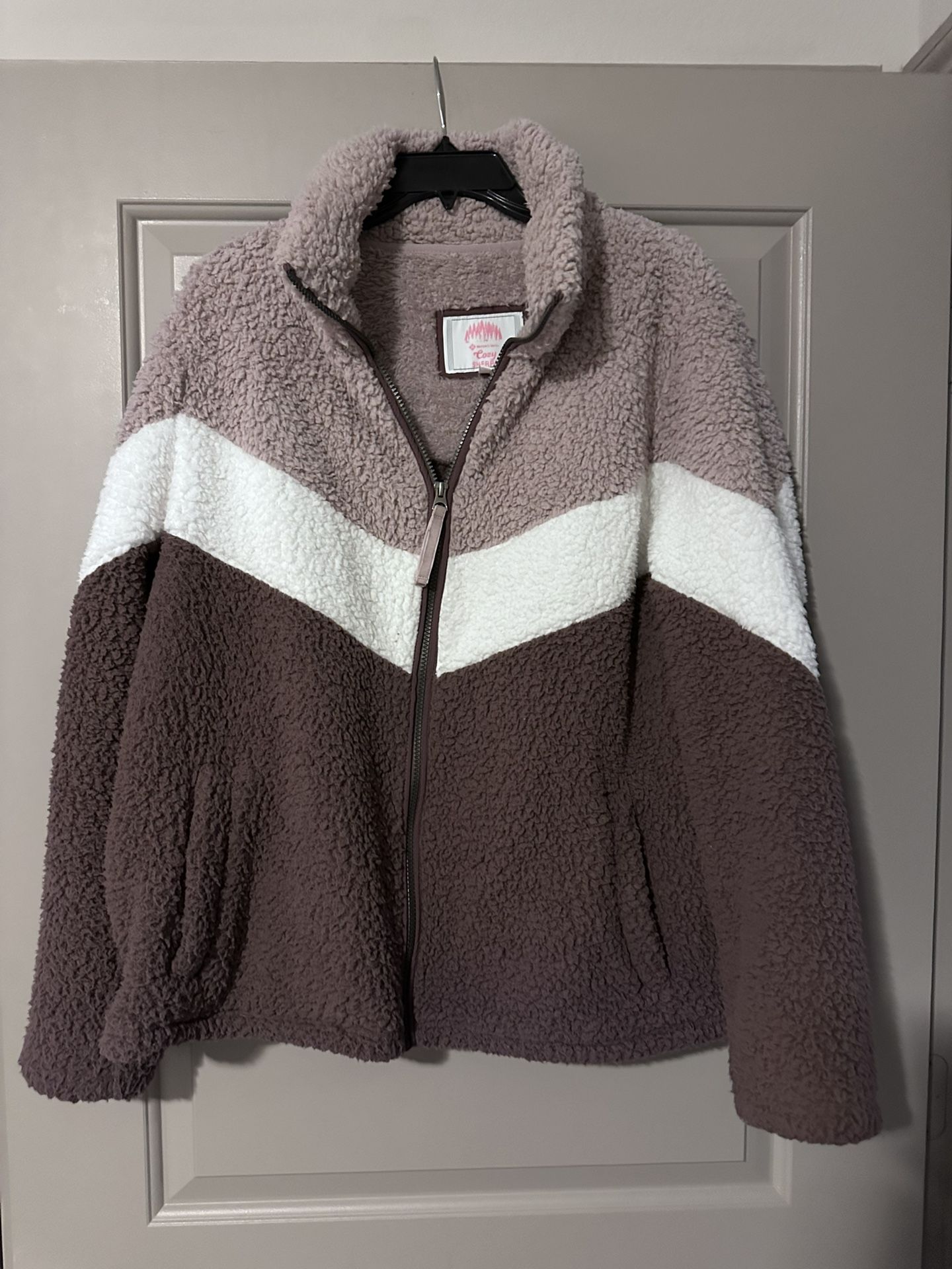 Mauve color block. Dusty rose, creamy white, dark raspberry. Zippered front. Nice color. Teddy style. Fleece lined. 100% polyester. Machine wash cold&