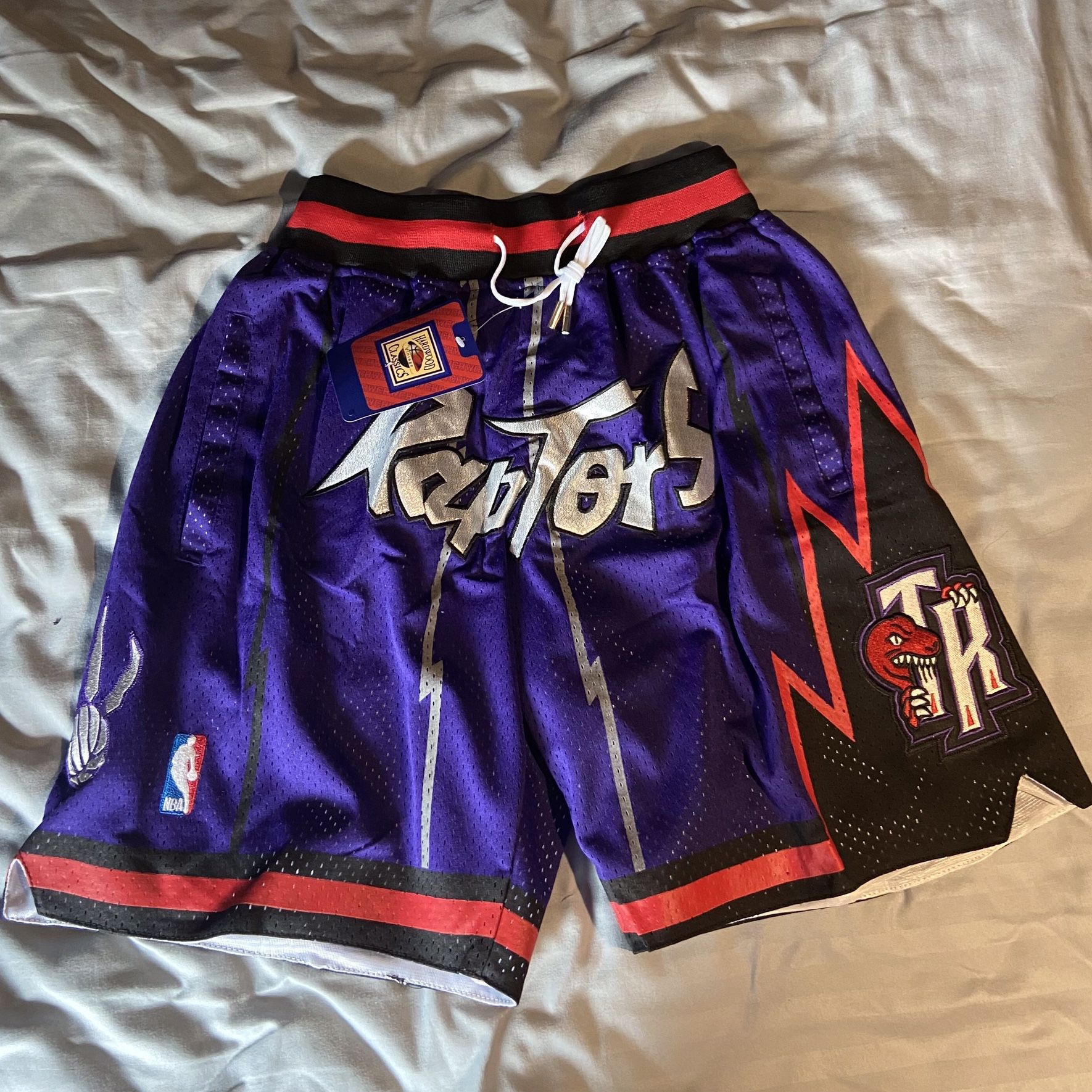 Urban Auctions - 2 PAIRS OF TORONTO RAPTORS SHORTS - VINTAGE NIKE & JUST DON  - SIZE L