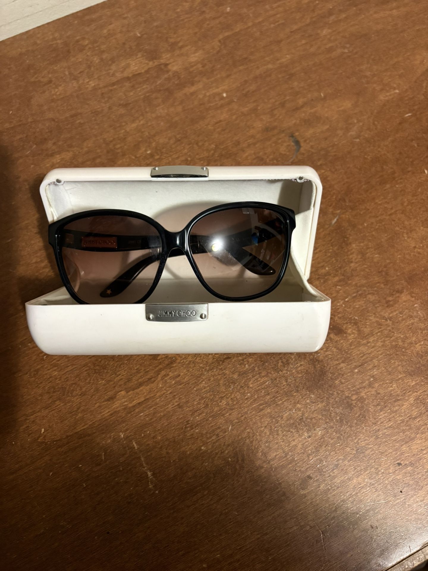 The Jimmy Choo Black cheetah print frames with brown lenses sunglasses