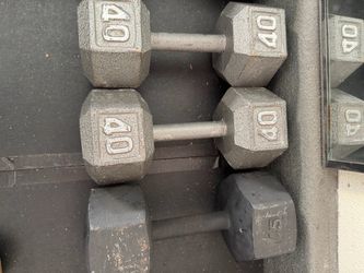 Pair of 40s dumbbells and single 45 dumbbell