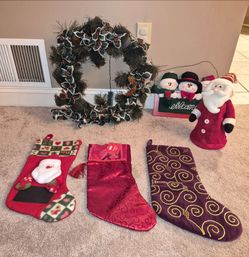 Christmas Decor Lot: Wreath, Stockings, Santa Clause