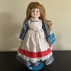 Vintage 1989 MYD Marian Yu Designs 16” Bisque Porcelain Doll. She stands gracefully with the assistance of her original display stand. This porcelain 