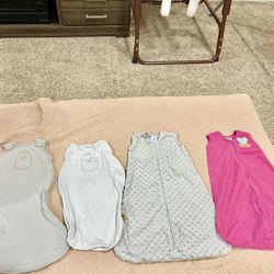 2 nested bean sleep sack, 2 halo fleece sleepsack, all 4 swaddles for $40 