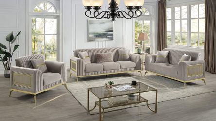 Premium textured upholstered sofa with elegant gold-tone metal accents