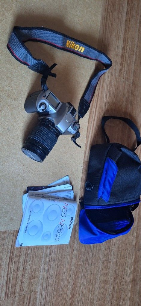 Nikon Camera With Manuals And Case