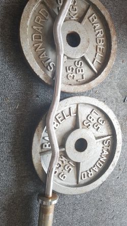 2× 35lbs plates with the ez curl bar