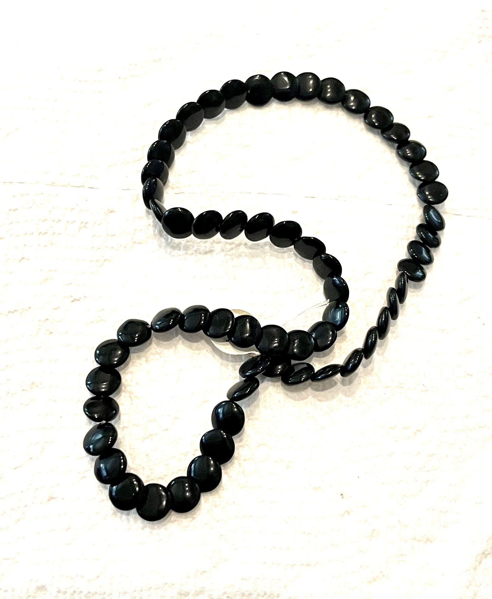 Strand Of Coin Onyx Beads