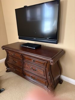 Traditional Wood Dresser with Ornate Carved Details