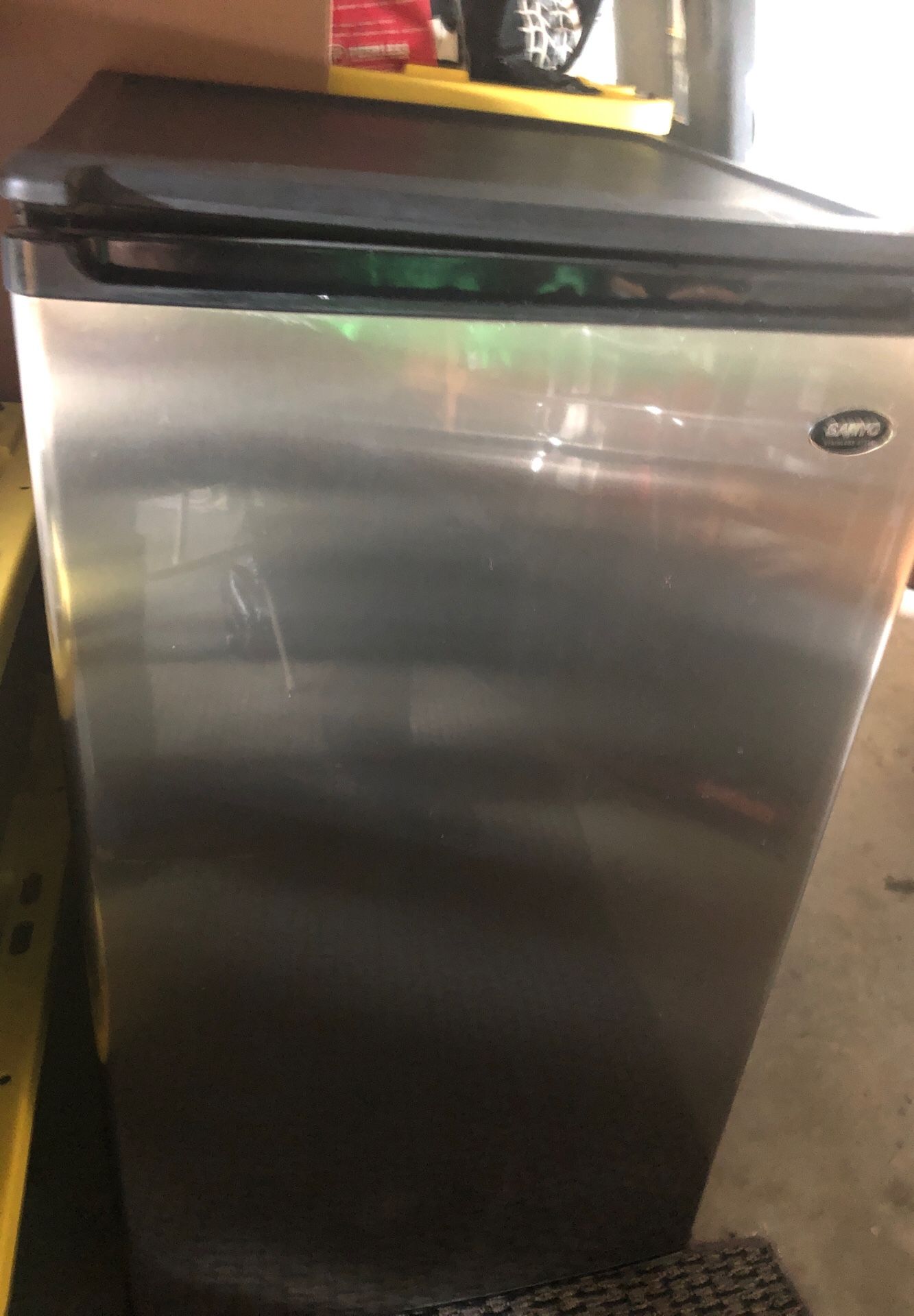 Slightly used Sanyo smaller type refrigerator. Great deal!