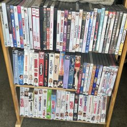 Lot Of Dvd/ VHS Movies And Stand 