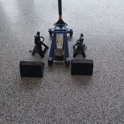 3 Ton Hydraulic Jack, Two 3 Ton Jack Stands, And Two Wheel Chucks