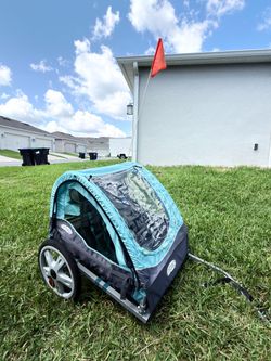 Selling an Instep bike trailer for 2 children.